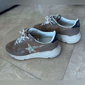 Brand new. Never worn. Golden goose running sneakers. Size 8. Size 38.